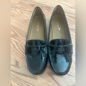 Coach black patent flats, size 7.